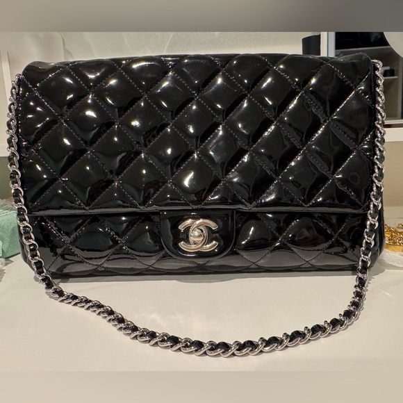 Authentic Chanel Patent Clutch
(Price is firm) - Picture 1 of 7